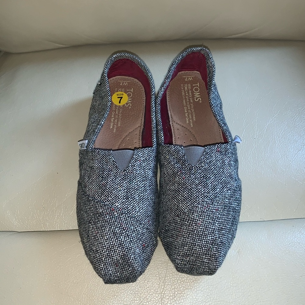 TOMS Silver color Slip ons Size 7